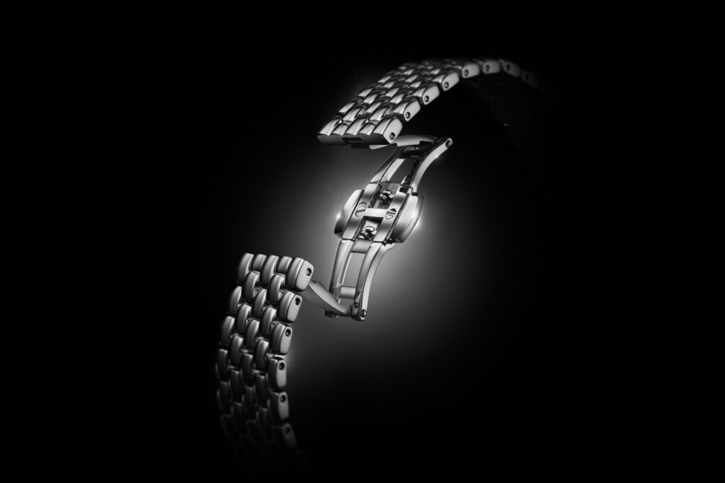 سوار Pebble Link المصنوع من الفولاذ المقاوم للصدأ بتصميم انسيابي وروابط مستديرة 